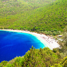 A vibrant snapshot of a day trip in Kefalonia, Greece, featuring adventure, exploration, and unforgettable moments against the backdrop of scenic landscapes and sun-kissed shores.
